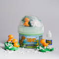 Dino Fetch Hivepod with orange dinosaur charms and bone-shaped sprinkles scattered around it