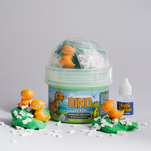 Dino Fetch Hivepod with orange dinosaur charms and bone-shaped sprinkles scattered around it