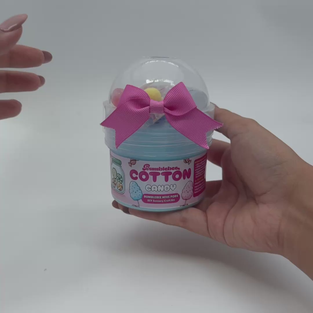 Video showing Cotton Candy butter slime Hivepod with pastel slime, lollipop charm and mix-ins