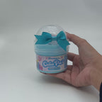 Video showing Cutie Pie smooth stretch slime Hivepod with sweetheart sprinkles and lollipop add-ons